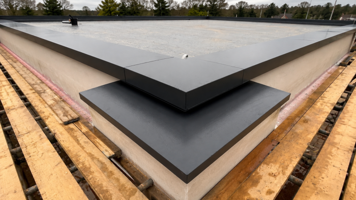 Aluminium Coping Prices: What Affects the Cost of Parapet Wall Coping 7 Aluminium coping prices for a bespoke stepped parapet corner finished with coordinated dark grey aluminium coping.