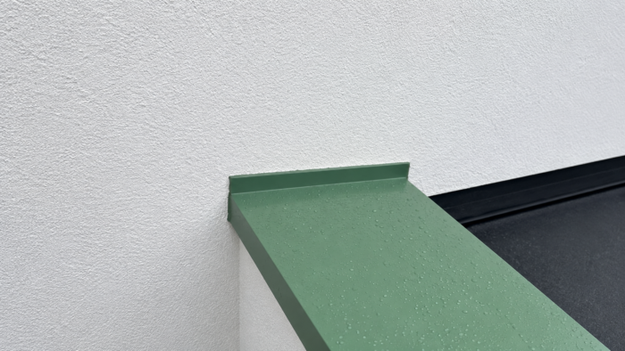 Aluminium Coping Installation: A Practical Guide for UK Projects 6 Aluminium coping installation finished neatly beside the rendered and brick exterior walls