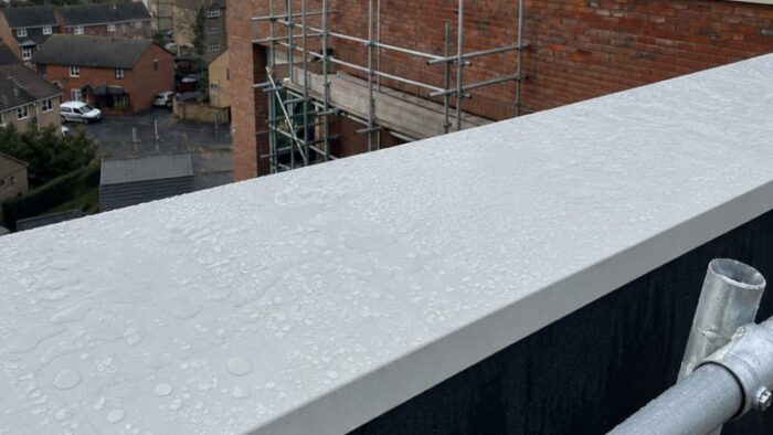 Cheapest Aluminium Coping: 7 Smart Buying Tips 4 Cheapest aluminium coping on a flat roof with solar panels and neat parapet edge finishing.