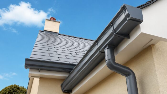 Box Guttering: What UK Projects Need to Get Right 4 Box guttering detail showing the roof edge connection and downpipe outlet.