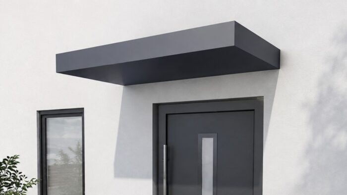 Door Canopy UK: What to Check Before You Buy 5 Door Canopy UK minimal house entrance featuring a neat canopy and premium architectural detailing.