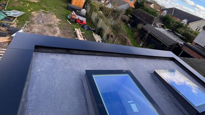 Parapet Wall Copings: What UK Projects Need to Get Right 6 Parapet wall copings showing a neat aluminium corner detail at roof level.