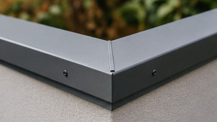 Roof Edge Flashing: Getting the Final Roof Detail Right 6 Roof edge flashing at a roof upstand and wall junction on a UK property