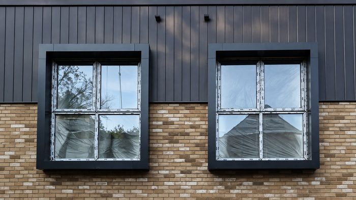 Choosing the Right Aluminium Profile for a Better Window Detail 5 Window aluminium profile installed on a rendered UK property with a contemporary finish