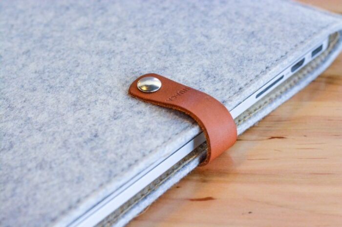 Close-up view of silver aluminium fascia board with textured finish on roofline
