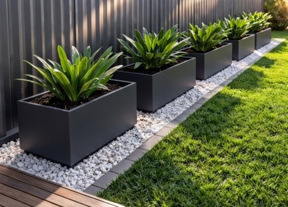 Aluminium planters transforming an outdoor garden space with vibrant plants